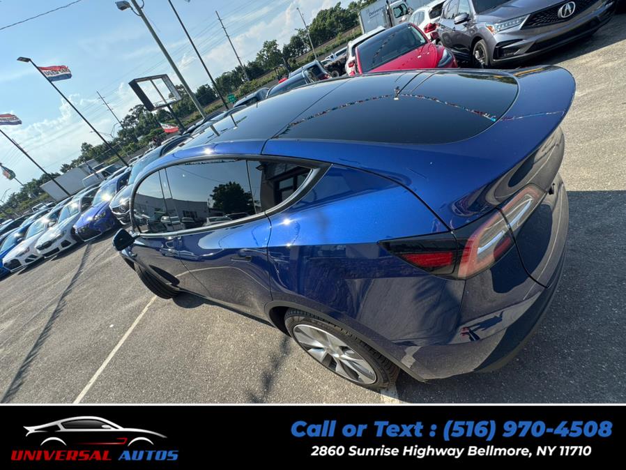 2023 Tesla Model Y Long Range AWD, available for sale in Bellmore, New York | Universal Autos. Bellmore, New York 2023 Tesla Model Y Long Range AWD, available for sale in Bellmore, New York | Universal Autos. Bellmore, New York