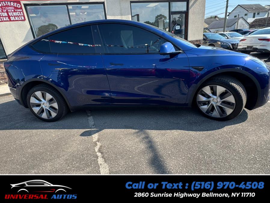2023 Tesla Model Y Long Range AWD, available for sale in Bellmore, New York | Universal Autos. Bellmore, New York 2023 Tesla Model Y Long Range AWD, available for sale in Bellmore, New York | Universal Autos. Bellmore, New York