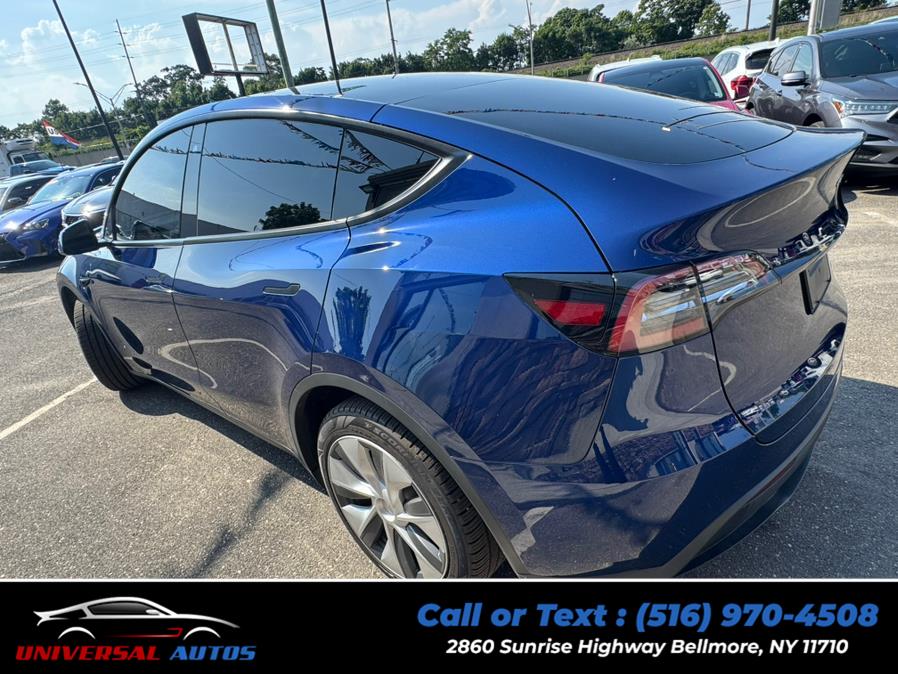 2023 Tesla Model Y Long Range AWD, available for sale in Bellmore, New York | Universal Autos. Bellmore, New York 2023 Tesla Model Y Long Range AWD, available for sale in Bellmore, New York | Universal Autos. Bellmore, New York