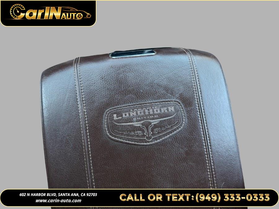 2014 Ram 1500 4WD Crew Cab 140.5" Longhorn Limited, available for sale in Santa Ana, California | Carin Auto. Santa Ana, California 2014 Ram 1500 4WD Crew Cab 140.5" Longhorn Limited, available for sale in Santa Ana, California | Carin Auto. Santa Ana, California