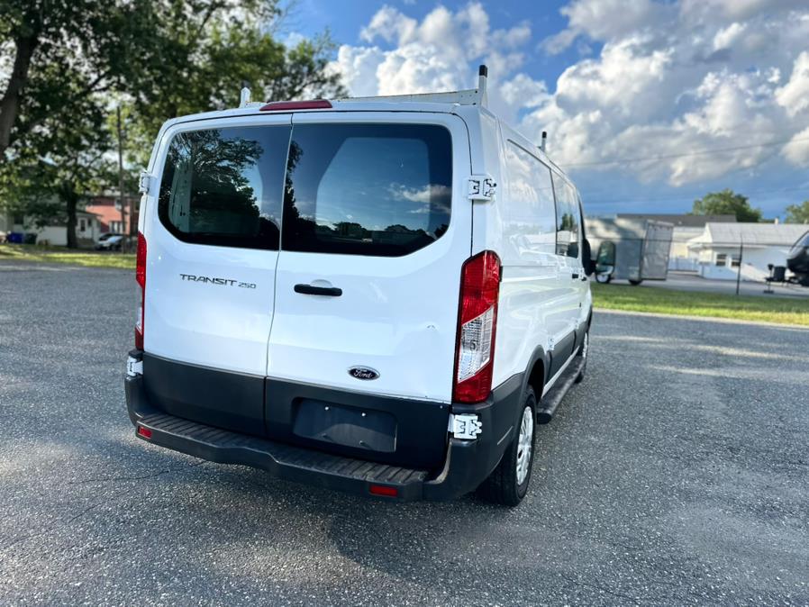 2015 Ford Transit Cargo Van T-250 130" Low Rf 9000 GVWR Swing-Out RH Dr, available for sale in Springfield, Massachusetts | Auto Globe LLC. Springfield, Massachusetts 2015 Ford Transit Cargo Van T-250 130" Low Rf 9000 GVWR Swing-Out RH Dr, available for sale in Springfield, Massachusetts | Auto Globe LLC. Springfield, Massachusetts