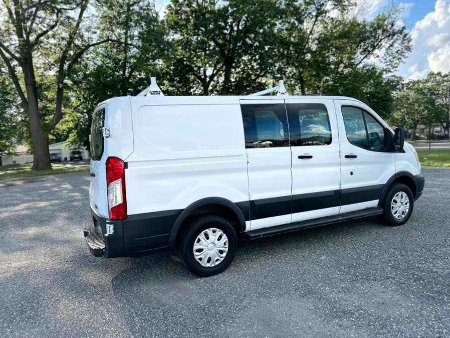 2015 Ford Transit Cargo Van T-250 130" Low Rf 9000 GVWR Swing-Out RH Dr, available for sale in Springfield, Massachusetts | Auto Globe LLC. Springfield, Massachusetts 2015 Ford Transit Cargo Van T-250 130" Low Rf 9000 GVWR Swing-Out RH Dr, available for sale in Springfield, Massachusetts | Auto Globe LLC. Springfield, Massachusetts