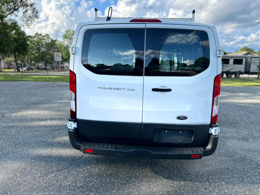 2015 Ford Transit Cargo Van T-250 130" Low Rf 9000 GVWR Swing-Out RH Dr, available for sale in Springfield, Massachusetts | Auto Globe LLC. Springfield, Massachusetts 2015 Ford Transit Cargo Van T-250 130" Low Rf 9000 GVWR Swing-Out RH Dr, available for sale in Springfield, Massachusetts | Auto Globe LLC. Springfield, Massachusetts