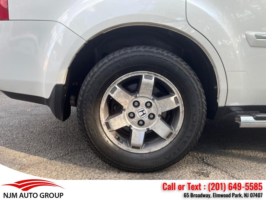 2011 Honda Pilot 4WD 4dr Touring w/RES & Navi, available for sale in Elmwood Park, New Jersey | NJM Auto Group. Elmwood Park, New Jersey 2011 Honda Pilot 4WD 4dr Touring w/RES & Navi, available for sale in Elmwood Park, New Jersey | NJM Auto Group. Elmwood Park, New Jersey