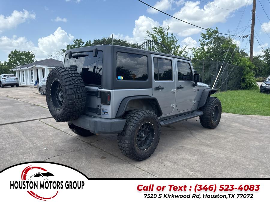 2013 Jeep Wrangler Unlimited 4WD 4dr Sport, available for sale in Houston, Texas | Houston Motors Group LLC. Houston, Texas 2013 Jeep Wrangler Unlimited 4WD 4dr Sport, available for sale in Houston, Texas | Houston Motors Group LLC. Houston, Texas