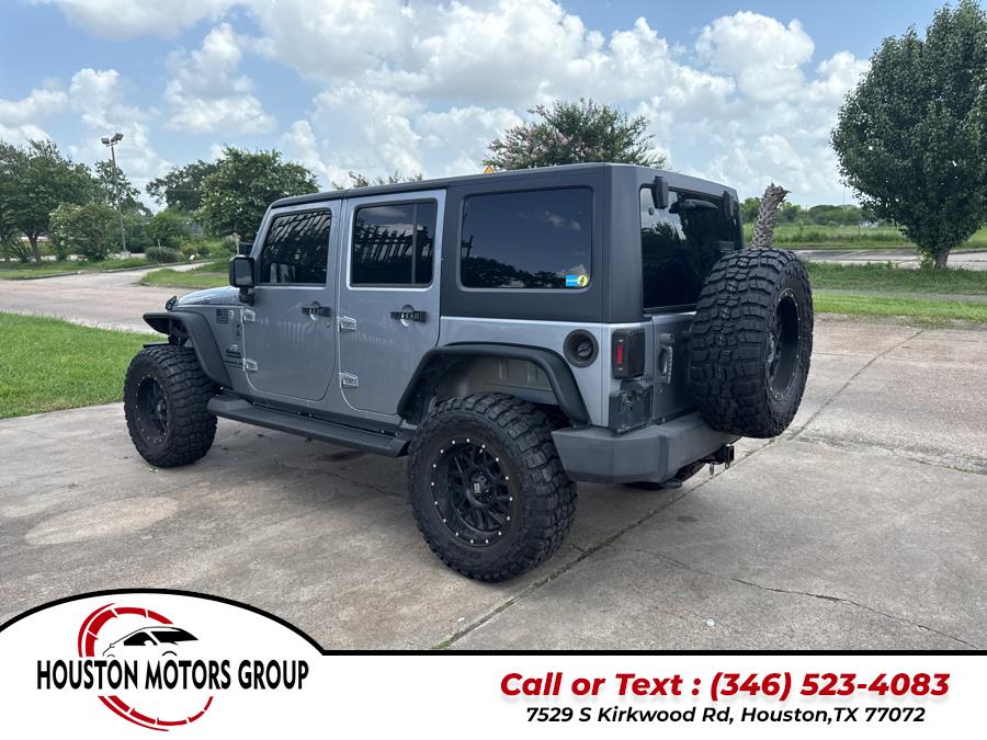 2013 Jeep Wrangler Unlimited 4WD 4dr Sport, available for sale in Houston, Texas | Houston Motors Group LLC. Houston, Texas 2013 Jeep Wrangler Unlimited 4WD 4dr Sport, available for sale in Houston, Texas | Houston Motors Group LLC. Houston, Texas