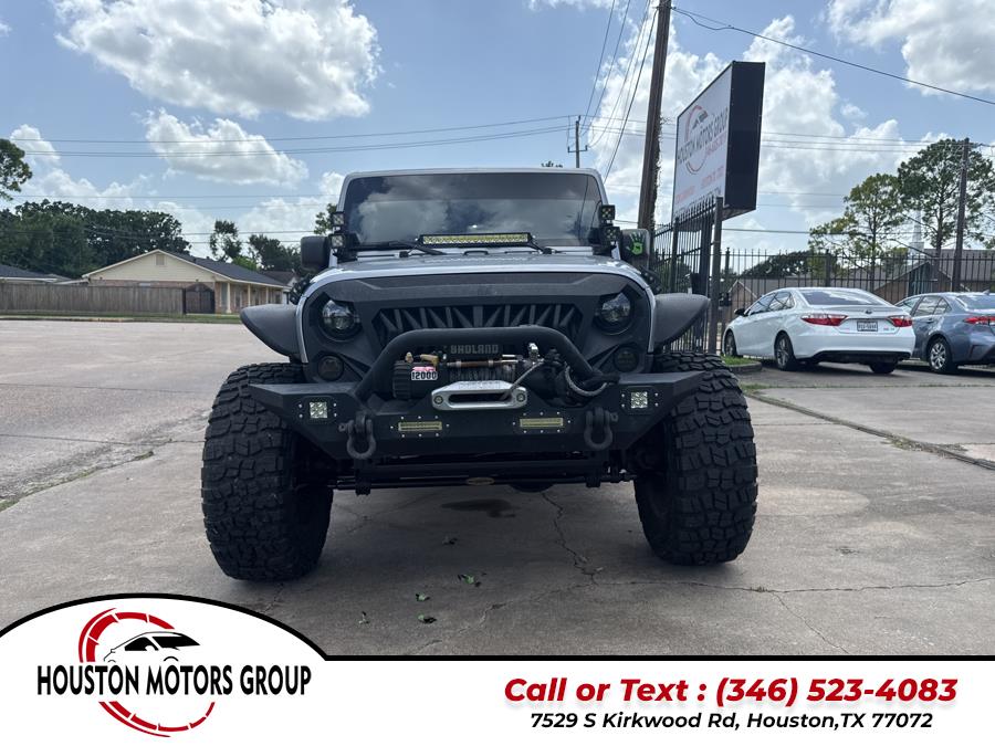 2013 Jeep Wrangler Unlimited 4WD 4dr Sport, available for sale in Houston, Texas | Houston Motors Group LLC. Houston, Texas 2013 Jeep Wrangler Unlimited 4WD 4dr Sport, available for sale in Houston, Texas | Houston Motors Group LLC. Houston, Texas