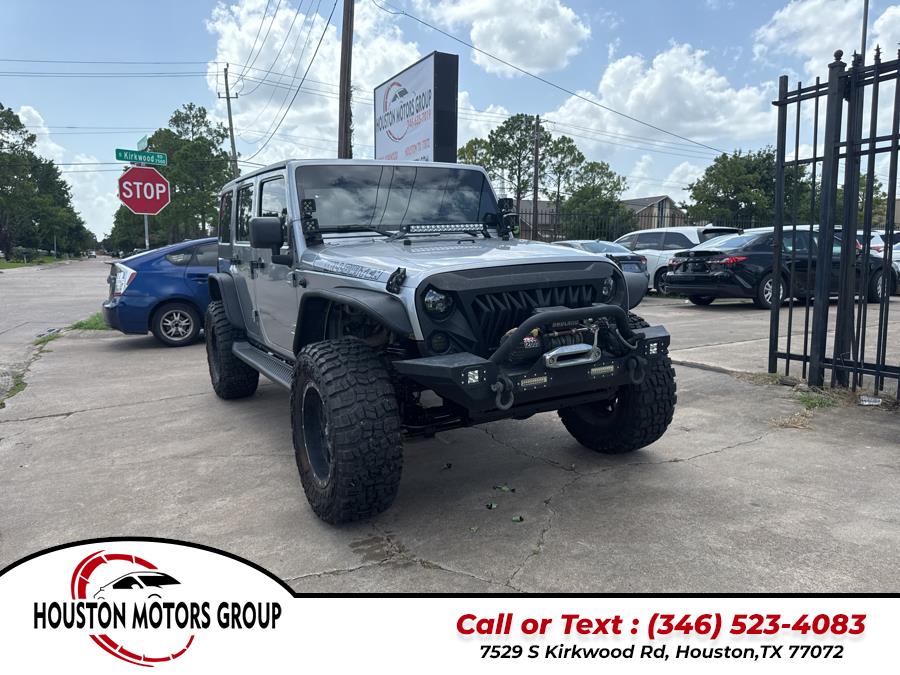 2013 Jeep Wrangler Unlimited 4WD 4dr Sport, available for sale in Houston, Texas | Houston Motors Group LLC. Houston, Texas 2013 Jeep Wrangler Unlimited 4WD 4dr Sport, available for sale in Houston, Texas | Houston Motors Group LLC. Houston, Texas