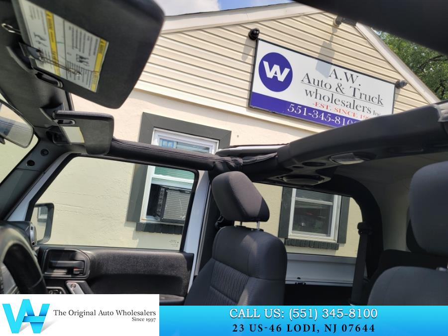 2011 Jeep Wrangler 4WD 2dr Sahara, available for sale in Lodi, New Jersey | AW Auto & Truck Wholesalers, Inc. Lodi, New Jersey 2011 Jeep Wrangler 4WD 2dr Sahara, available for sale in Lodi, New Jersey | AW Auto & Truck Wholesalers, Inc. Lodi, New Jersey