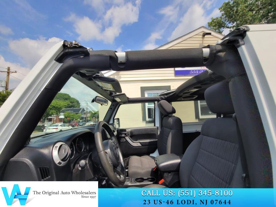 2011 Jeep Wrangler 4WD 2dr Sahara, available for sale in Lodi, New Jersey | AW Auto & Truck Wholesalers, Inc. Lodi, New Jersey 2011 Jeep Wrangler 4WD 2dr Sahara, available for sale in Lodi, New Jersey | AW Auto & Truck Wholesalers, Inc. Lodi, New Jersey