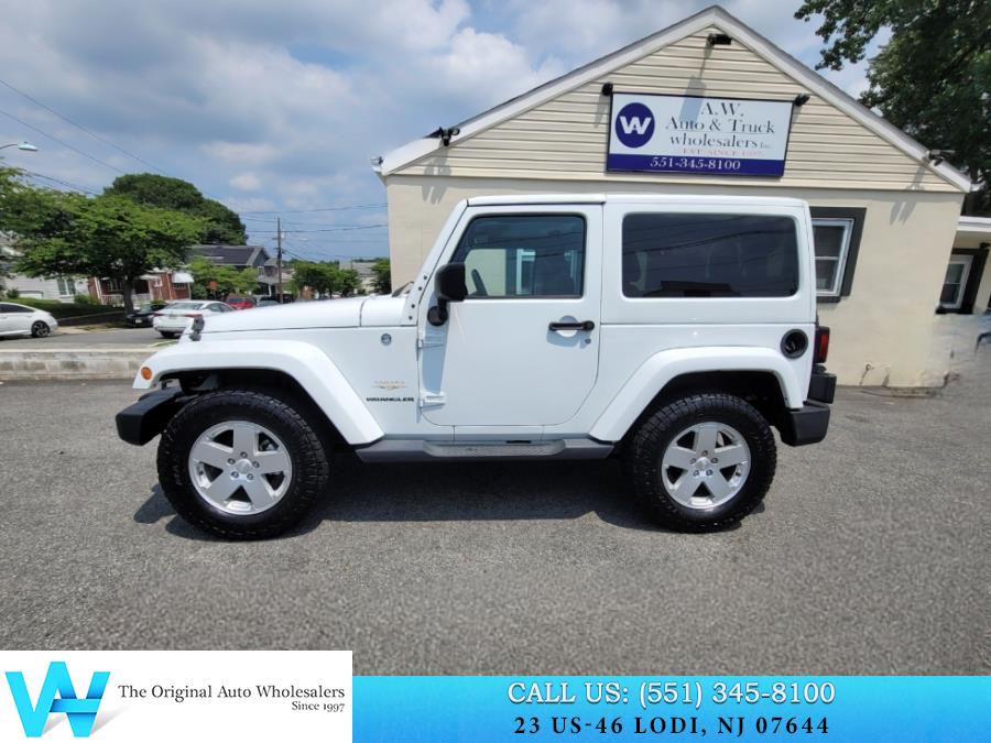 2011 Jeep Wrangler 4WD 2dr Sahara, available for sale in Lodi, New Jersey | AW Auto & Truck Wholesalers, Inc. Lodi, New Jersey 2011 Jeep Wrangler 4WD 2dr Sahara, available for sale in Lodi, New Jersey | AW Auto & Truck Wholesalers, Inc. Lodi, New Jersey