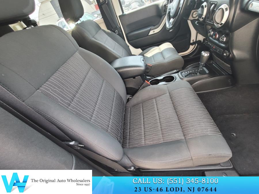 2011 Jeep Wrangler 4WD 2dr Sahara, available for sale in Lodi, New Jersey | AW Auto & Truck Wholesalers, Inc. Lodi, New Jersey 2011 Jeep Wrangler 4WD 2dr Sahara, available for sale in Lodi, New Jersey | AW Auto & Truck Wholesalers, Inc. Lodi, New Jersey