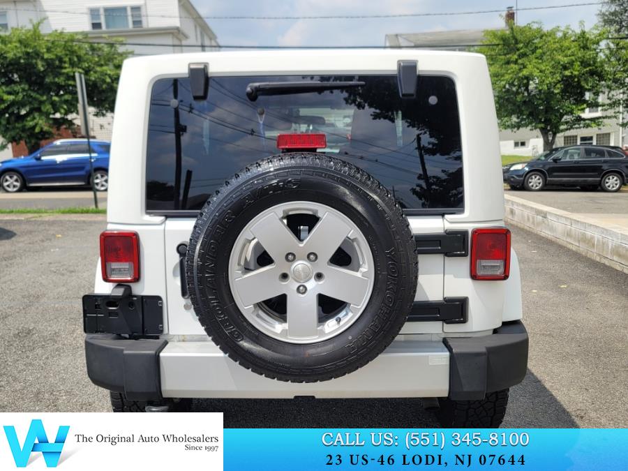 2011 Jeep Wrangler 4WD 2dr Sahara, available for sale in Lodi, New Jersey | AW Auto & Truck Wholesalers, Inc. Lodi, New Jersey 2011 Jeep Wrangler 4WD 2dr Sahara, available for sale in Lodi, New Jersey | AW Auto & Truck Wholesalers, Inc. Lodi, New Jersey