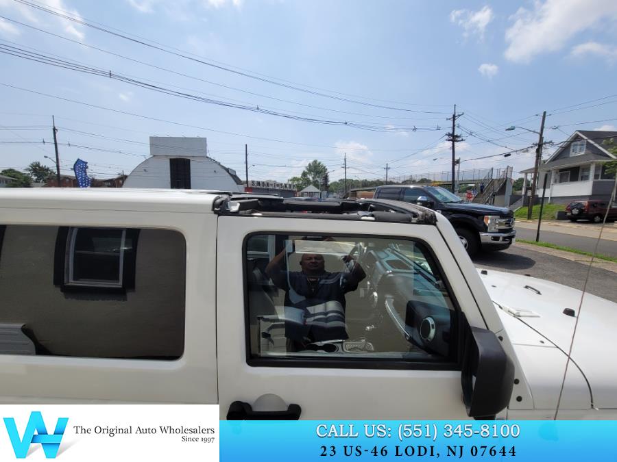 2011 Jeep Wrangler 4WD 2dr Sahara, available for sale in Lodi, New Jersey | AW Auto & Truck Wholesalers, Inc. Lodi, New Jersey 2011 Jeep Wrangler 4WD 2dr Sahara, available for sale in Lodi, New Jersey | AW Auto & Truck Wholesalers, Inc. Lodi, New Jersey