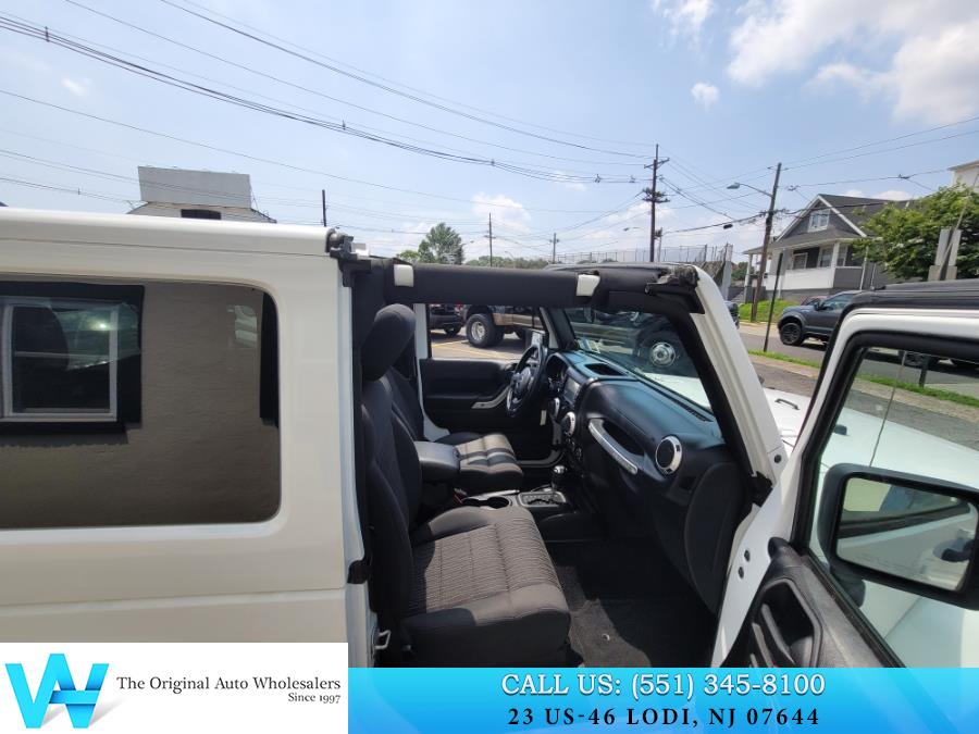2011 Jeep Wrangler 4WD 2dr Sahara, available for sale in Lodi, New Jersey | AW Auto & Truck Wholesalers, Inc. Lodi, New Jersey 2011 Jeep Wrangler 4WD 2dr Sahara, available for sale in Lodi, New Jersey | AW Auto & Truck Wholesalers, Inc. Lodi, New Jersey