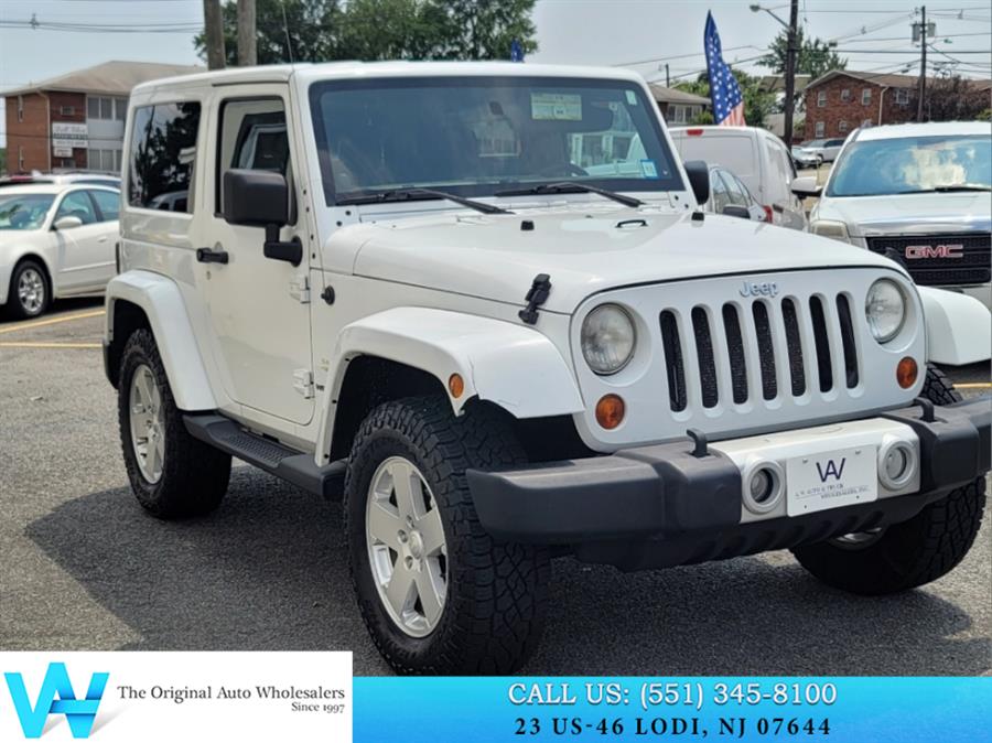 2011 Jeep Wrangler 4WD 2dr Sahara, available for sale in Lodi, New Jersey | AW Auto & Truck Wholesalers, Inc. Lodi, New Jersey 2011 Jeep Wrangler 4WD 2dr Sahara, available for sale in Lodi, New Jersey | AW Auto & Truck Wholesalers, Inc. Lodi, New Jersey