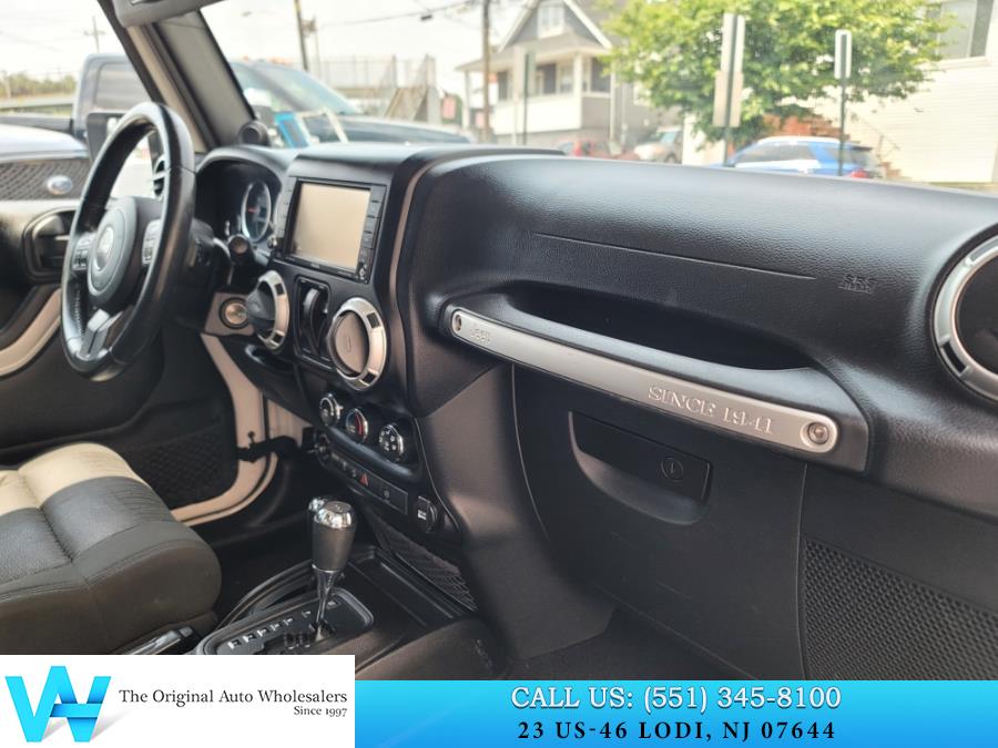 2011 Jeep Wrangler 4WD 2dr Sahara, available for sale in Lodi, New Jersey | AW Auto & Truck Wholesalers, Inc. Lodi, New Jersey 2011 Jeep Wrangler 4WD 2dr Sahara, available for sale in Lodi, New Jersey | AW Auto & Truck Wholesalers, Inc. Lodi, New Jersey