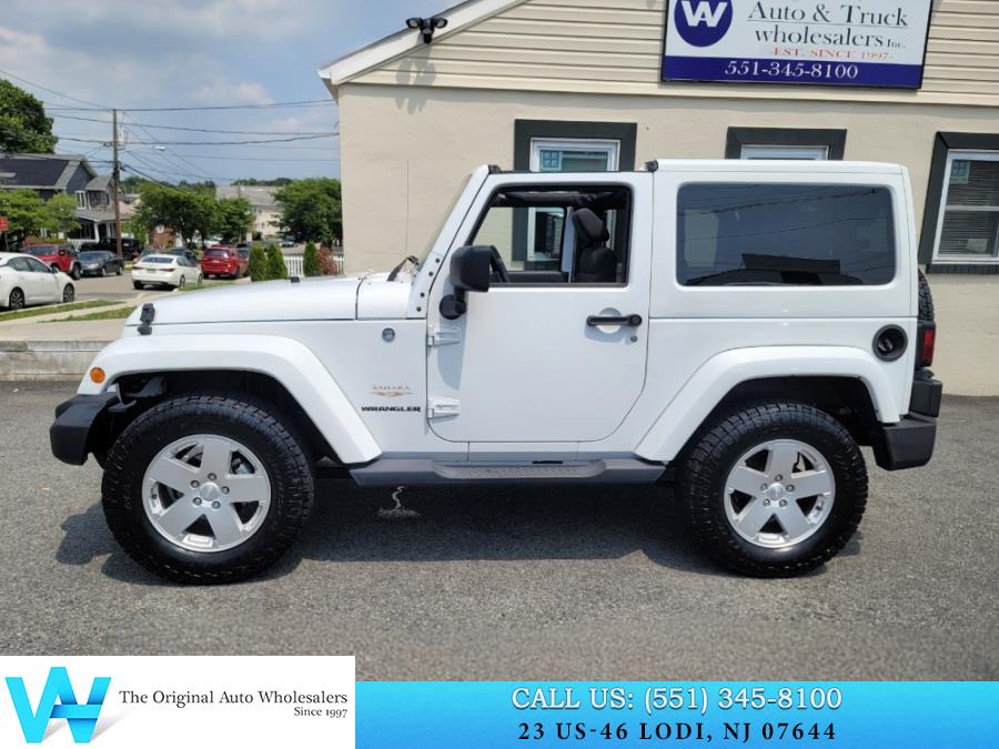 2011 Jeep Wrangler 4WD 2dr Sahara, available for sale in Lodi, New Jersey | AW Auto & Truck Wholesalers, Inc. Lodi, New Jersey 2011 Jeep Wrangler 4WD 2dr Sahara, available for sale in Lodi, New Jersey | AW Auto & Truck Wholesalers, Inc. Lodi, New Jersey
