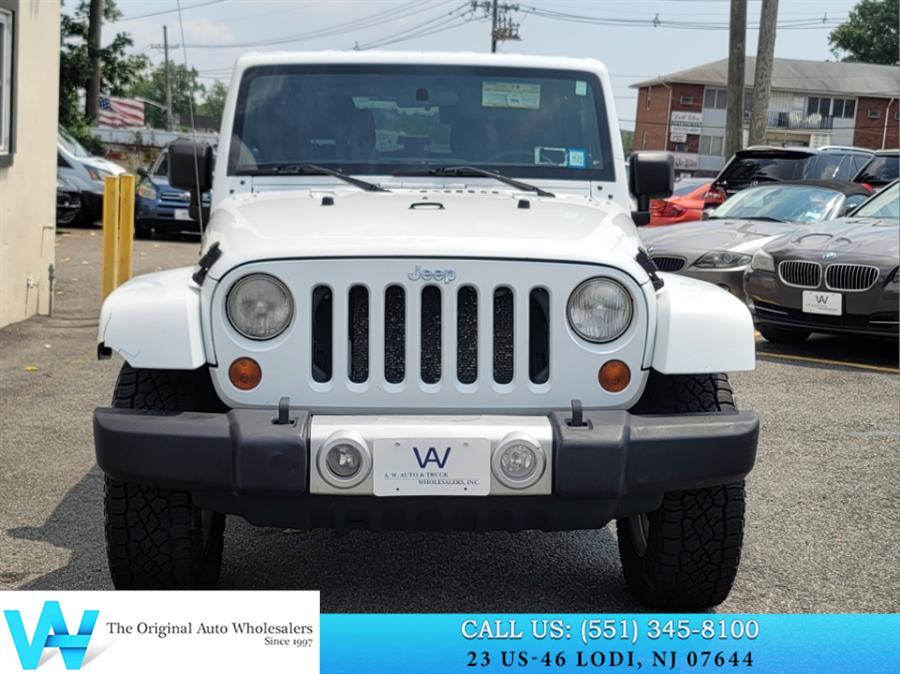 2011 Jeep Wrangler 4WD 2dr Sahara, available for sale in Lodi, New Jersey | AW Auto & Truck Wholesalers, Inc. Lodi, New Jersey 2011 Jeep Wrangler 4WD 2dr Sahara, available for sale in Lodi, New Jersey | AW Auto & Truck Wholesalers, Inc. Lodi, New Jersey