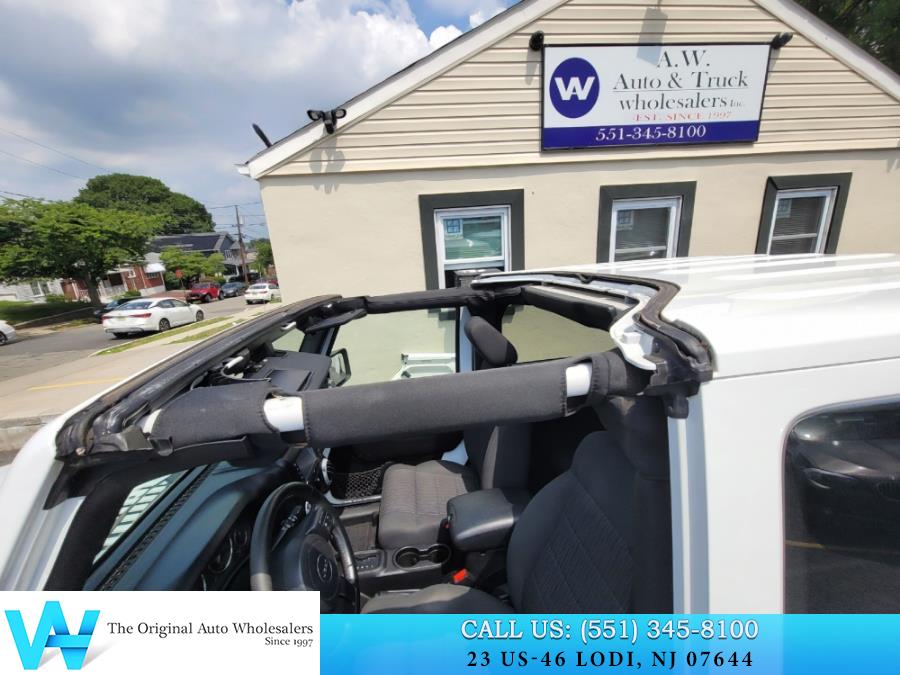 2011 Jeep Wrangler 4WD 2dr Sahara, available for sale in Lodi, New Jersey | AW Auto & Truck Wholesalers, Inc. Lodi, New Jersey 2011 Jeep Wrangler 4WD 2dr Sahara, available for sale in Lodi, New Jersey | AW Auto & Truck Wholesalers, Inc. Lodi, New Jersey