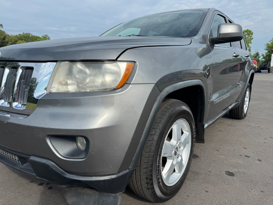2012 Jeep Grand Cherokee 4WD 4dr Laredo, available for sale in Ortonville, Michigan | Marsh Auto Sales LLC. Ortonville, Michigan 2012 Jeep Grand Cherokee 4WD 4dr Laredo, available for sale in Ortonville, Michigan | Marsh Auto Sales LLC. Ortonville, Michigan