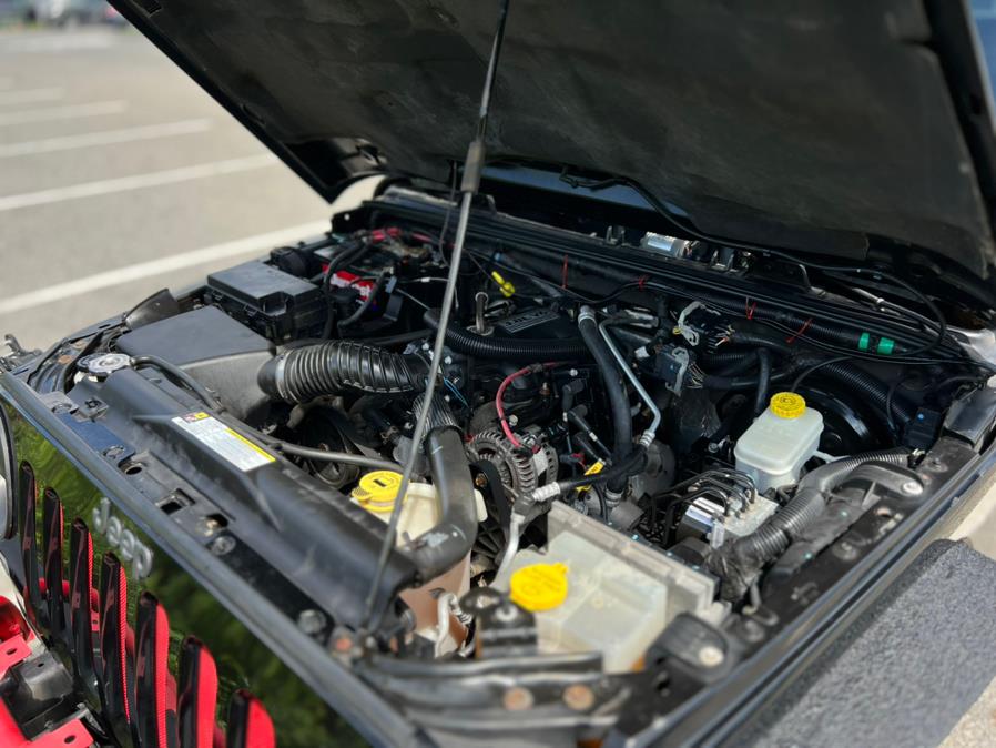 2011 Jeep Wrangler 4WD 2dr Sahara, available for sale in Paterson, New Jersey | Speedway Motors LLC. Paterson, New Jersey 2011 Jeep Wrangler 4WD 2dr Sahara, available for sale in Paterson, New Jersey | Speedway Motors LLC. Paterson, New Jersey