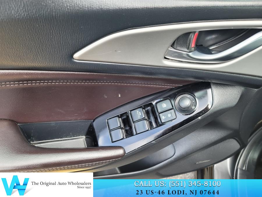 2017 Mazda Mazda3 4-Door Touring Auto, available for sale in Lodi, New Jersey | AW Auto & Truck Wholesalers, Inc. Lodi, New Jersey 2017 Mazda Mazda3 4-Door Touring Auto, available for sale in Lodi, New Jersey | AW Auto & Truck Wholesalers, Inc. Lodi, New Jersey