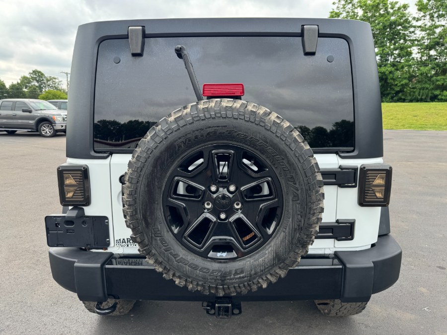 2016 Jeep Wrangler Unlimited 4WD 4dr Sport, available for sale in Ortonville, Michigan | Marsh Auto Sales LLC. Ortonville, Michigan 2016 Jeep Wrangler Unlimited 4WD 4dr Sport, available for sale in Ortonville, Michigan | Marsh Auto Sales LLC. Ortonville, Michigan