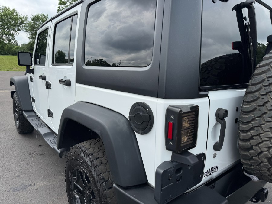2016 Jeep Wrangler Unlimited 4WD 4dr Sport, available for sale in Ortonville, Michigan | Marsh Auto Sales LLC. Ortonville, Michigan 2016 Jeep Wrangler Unlimited 4WD 4dr Sport, available for sale in Ortonville, Michigan | Marsh Auto Sales LLC. Ortonville, Michigan