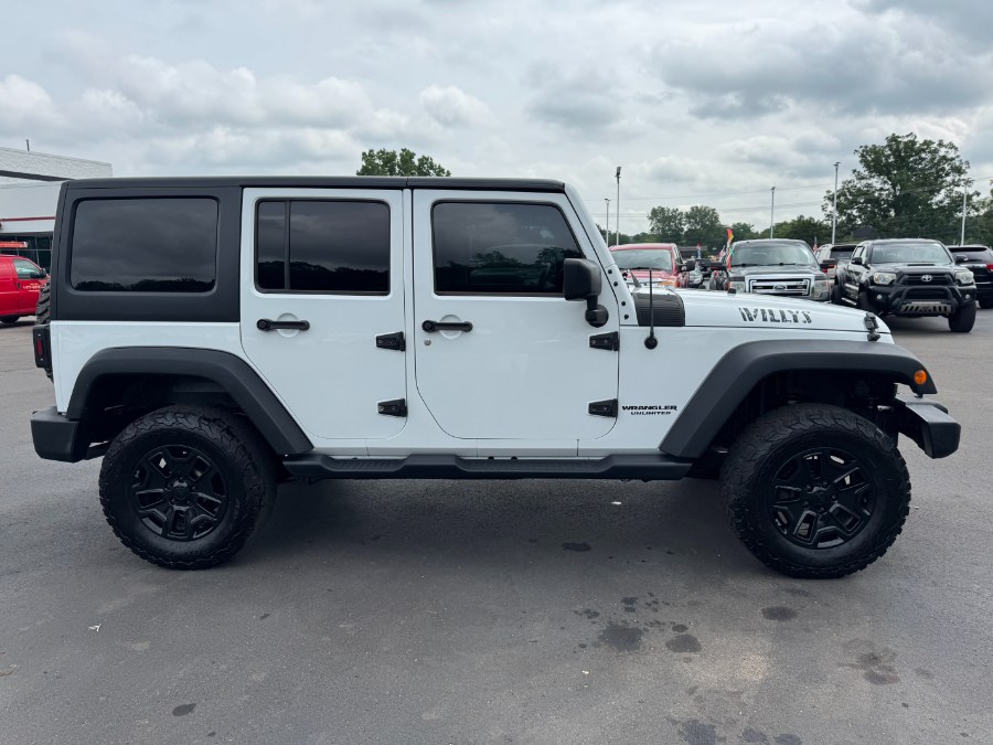 2016 Jeep Wrangler Unlimited 4WD 4dr Sport, available for sale in Ortonville, Michigan | Marsh Auto Sales LLC. Ortonville, Michigan 2016 Jeep Wrangler Unlimited 4WD 4dr Sport, available for sale in Ortonville, Michigan | Marsh Auto Sales LLC. Ortonville, Michigan