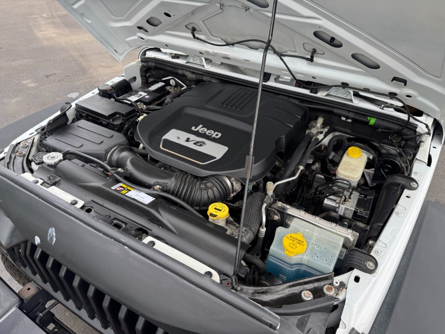 2016 Jeep Wrangler Unlimited 4WD 4dr Sport, available for sale in Ortonville, Michigan | Marsh Auto Sales LLC. Ortonville, Michigan 2016 Jeep Wrangler Unlimited 4WD 4dr Sport, available for sale in Ortonville, Michigan | Marsh Auto Sales LLC. Ortonville, Michigan
