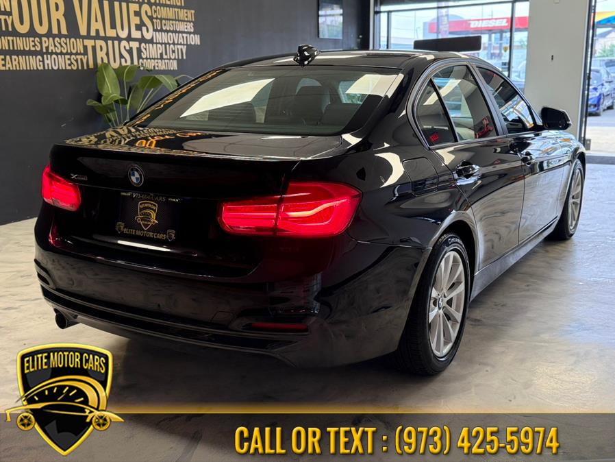 2018 BMW 3 Series 320i xDrive Sedan, available for sale in Newark, New Jersey | Elite Motor Cars. Newark, New Jersey 2018 BMW 3 Series 320i xDrive Sedan, available for sale in Newark, New Jersey | Elite Motor Cars. Newark, New Jersey