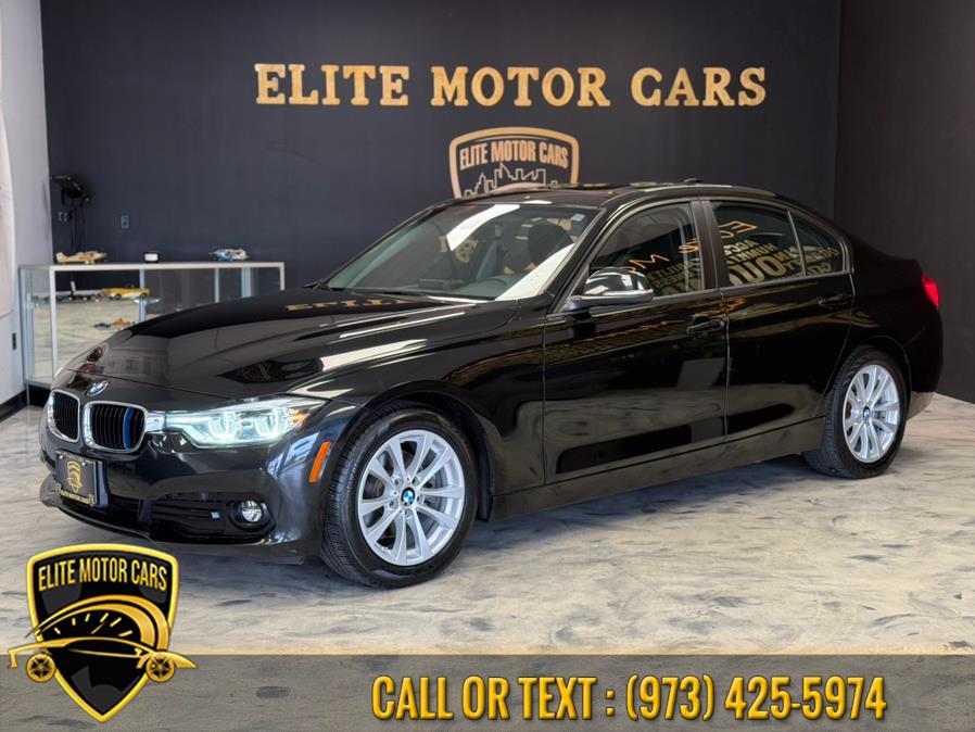 2018 BMW 3 Series 320i xDrive Sedan, available for sale in Newark, New Jersey | Elite Motor Cars. Newark, New Jersey 2018 BMW 3 Series 320i xDrive Sedan, available for sale in Newark, New Jersey | Elite Motor Cars. Newark, New Jersey