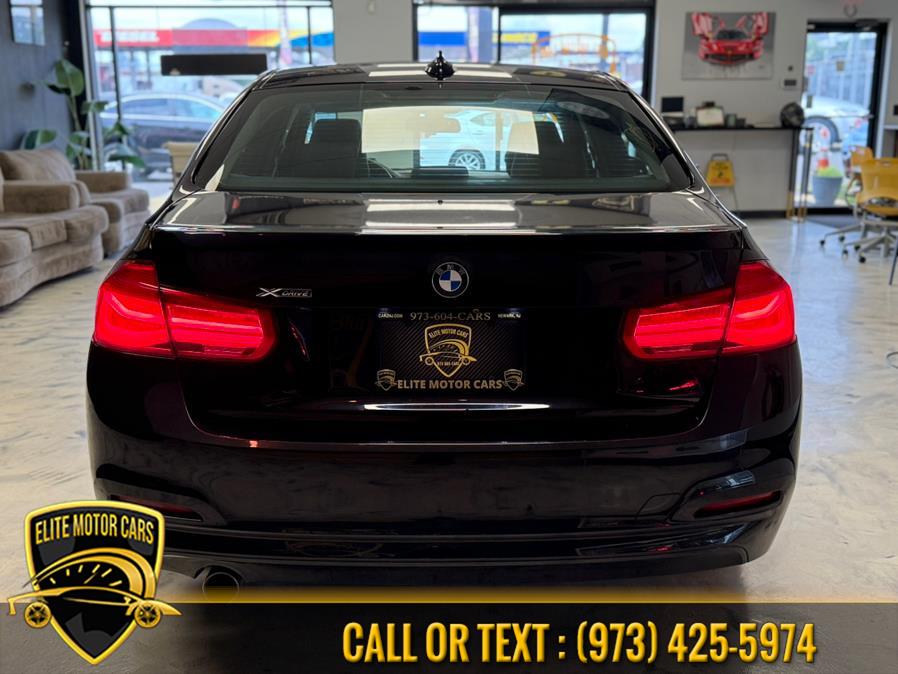2018 BMW 3 Series 320i xDrive Sedan, available for sale in Newark, New Jersey | Elite Motor Cars. Newark, New Jersey 2018 BMW 3 Series 320i xDrive Sedan, available for sale in Newark, New Jersey | Elite Motor Cars. Newark, New Jersey