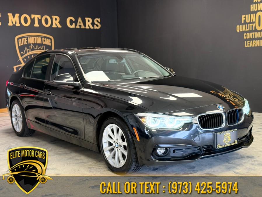2018 BMW 3 Series 320i xDrive Sedan, available for sale in Newark, New Jersey | Elite Motor Cars. Newark, New Jersey 2018 BMW 3 Series 320i xDrive Sedan, available for sale in Newark, New Jersey | Elite Motor Cars. Newark, New Jersey
