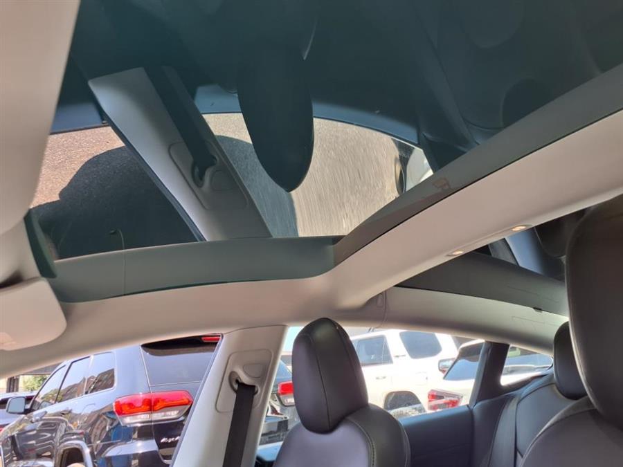 2021 Tesla Model 3 Standard Range Plus RWD, available for sale in Flushing, New York | Silverline Auto Group. Flushing, New York 2021 Tesla Model 3 Standard Range Plus RWD, available for sale in Flushing, New York | Silverline Auto Group. Flushing, New York