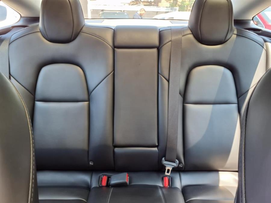 2021 Tesla Model 3 Standard Range Plus RWD, available for sale in Flushing, New York | Silverline Auto Group. Flushing, New York 2021 Tesla Model 3 Standard Range Plus RWD, available for sale in Flushing, New York | Silverline Auto Group. Flushing, New York