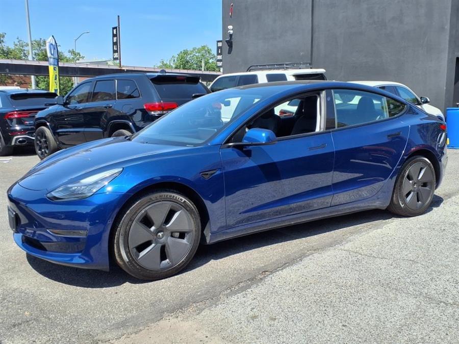 2021 Tesla Model 3 Standard Range Plus RWD, available for sale in Flushing, New York | Silverline Auto Group. Flushing, New York 2021 Tesla Model 3 Standard Range Plus RWD, available for sale in Flushing, New York | Silverline Auto Group. Flushing, New York