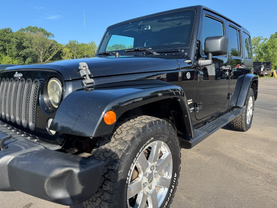 2015 Jeep Wrangler Unlimited 4WD 4dr Sahara, available for sale in Ortonville, Michigan | Marsh Auto Sales LLC. Ortonville, Michigan 2015 Jeep Wrangler Unlimited 4WD 4dr Sahara, available for sale in Ortonville, Michigan | Marsh Auto Sales LLC. Ortonville, Michigan