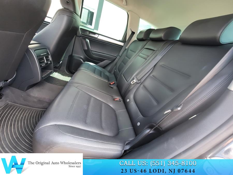2014 Volkswagen Touareg 4dr 3.6L Sport, available for sale in Lodi, New Jersey | AW Auto & Truck Wholesalers, Inc. Lodi, New Jersey 2014 Volkswagen Touareg 4dr 3.6L Sport, available for sale in Lodi, New Jersey | AW Auto & Truck Wholesalers, Inc. Lodi, New Jersey