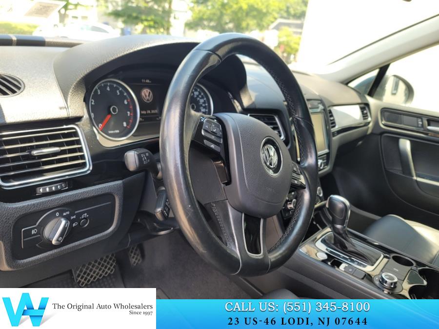 2014 Volkswagen Touareg 4dr 3.6L Sport, available for sale in Lodi, New Jersey | AW Auto & Truck Wholesalers, Inc. Lodi, New Jersey 2014 Volkswagen Touareg 4dr 3.6L Sport, available for sale in Lodi, New Jersey | AW Auto & Truck Wholesalers, Inc. Lodi, New Jersey