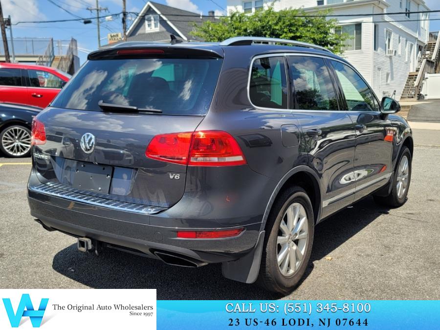2014 Volkswagen Touareg 4dr 3.6L Sport, available for sale in Lodi, New Jersey | AW Auto & Truck Wholesalers, Inc. Lodi, New Jersey 2014 Volkswagen Touareg 4dr 3.6L Sport, available for sale in Lodi, New Jersey | AW Auto & Truck Wholesalers, Inc. Lodi, New Jersey