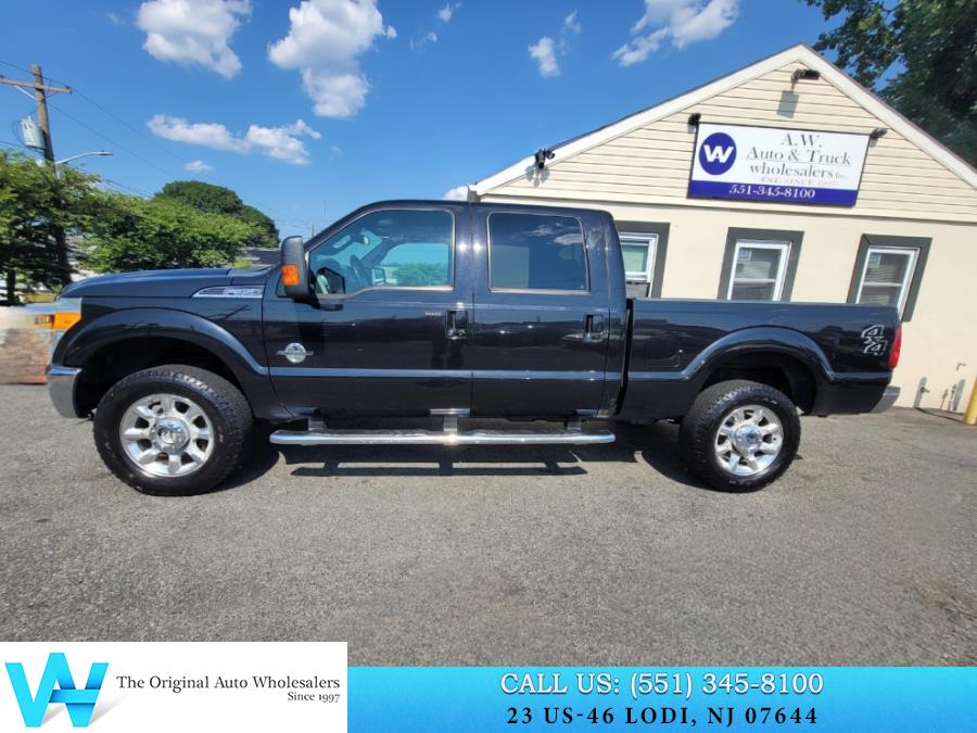 2014 Ford Super Duty F-350 SRW 4WD Crew Cab 156" Lariat, available for sale in Lodi, New Jersey | AW Auto & Truck Wholesalers, Inc. Lodi, New Jersey 2014 Ford Super Duty F-350 SRW 4WD Crew Cab 156" Lariat, available for sale in Lodi, New Jersey | AW Auto & Truck Wholesalers, Inc. Lodi, New Jersey
