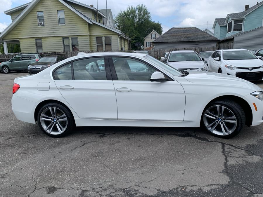 2018 BMW 3 Series 330i xDrive Sedan, available for sale in Springfield, Massachusetts | Absolute Motors Inc. Springfield, Massachusetts 2018 BMW 3 Series 330i xDrive Sedan, available for sale in Springfield, Massachusetts | Absolute Motors Inc. Springfield, Massachusetts