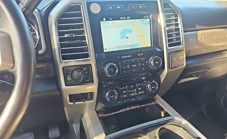 2017 Ford Super Duty F-250 SRW Lariat 4WD Crew Cab 8'' Box, available for sale in Fort Myers, Florida | Carlux Fort Myers. Fort Myers, Florida 2017 Ford Super Duty F-250 SRW Lariat 4WD Crew Cab 8'' Box, available for sale in Fort Myers, Florida | Carlux Fort Myers. Fort Myers, Florida