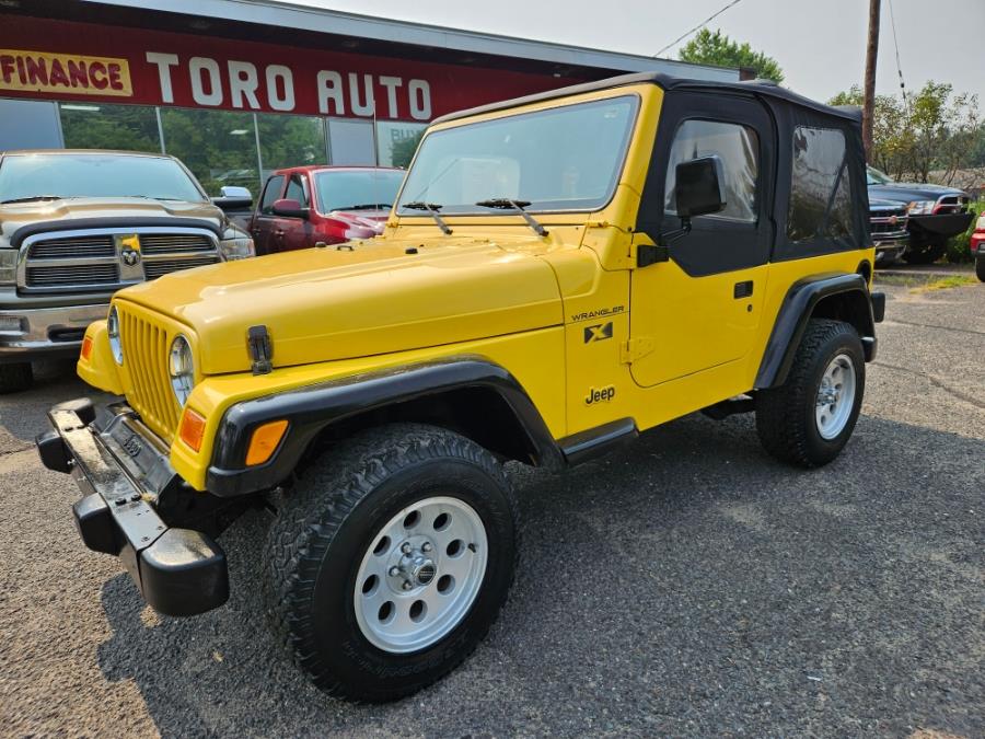 2002 Jeep Wrangler 2dr X 4WD~4.0 Straight Six, available for sale in East Windsor, Connecticut | Toro Auto. East Windsor, Connecticut 2002 Jeep Wrangler 2dr X 4WD~4.0 Straight Six, available for sale in East Windsor, Connecticut | Toro Auto. East Windsor, Connecticut