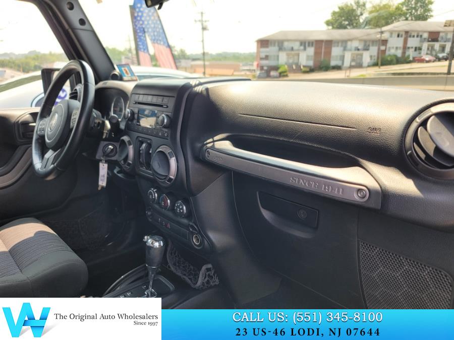 2012 Jeep Wrangler Unlimited 4WD 4dr Sport, available for sale in Lodi, New Jersey | AW Auto & Truck Wholesalers, Inc. Lodi, New Jersey 2012 Jeep Wrangler Unlimited 4WD 4dr Sport, available for sale in Lodi, New Jersey | AW Auto & Truck Wholesalers, Inc. Lodi, New Jersey
