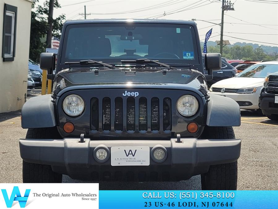 2012 Jeep Wrangler Unlimited 4WD 4dr Sport, available for sale in Lodi, New Jersey | AW Auto & Truck Wholesalers, Inc. Lodi, New Jersey 2012 Jeep Wrangler Unlimited 4WD 4dr Sport, available for sale in Lodi, New Jersey | AW Auto & Truck Wholesalers, Inc. Lodi, New Jersey