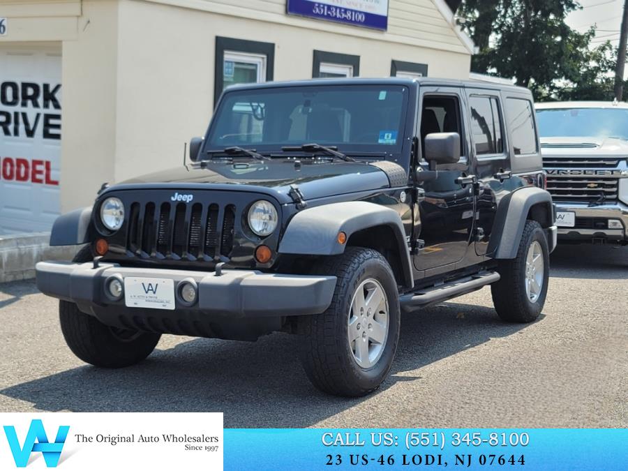 2012 Jeep Wrangler Unlimited 4WD 4dr Sport, available for sale in Lodi, New Jersey | AW Auto & Truck Wholesalers, Inc. Lodi, New Jersey 2012 Jeep Wrangler Unlimited 4WD 4dr Sport, available for sale in Lodi, New Jersey | AW Auto & Truck Wholesalers, Inc. Lodi, New Jersey