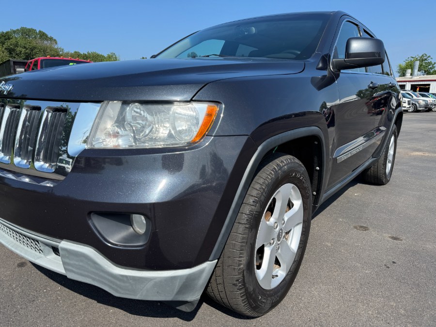 2012 Jeep Grand Cherokee 4WD 4dr Laredo Altitude, available for sale in Ortonville, Michigan | Marsh Auto Sales LLC. Ortonville, Michigan 2012 Jeep Grand Cherokee 4WD 4dr Laredo Altitude, available for sale in Ortonville, Michigan | Marsh Auto Sales LLC. Ortonville, Michigan